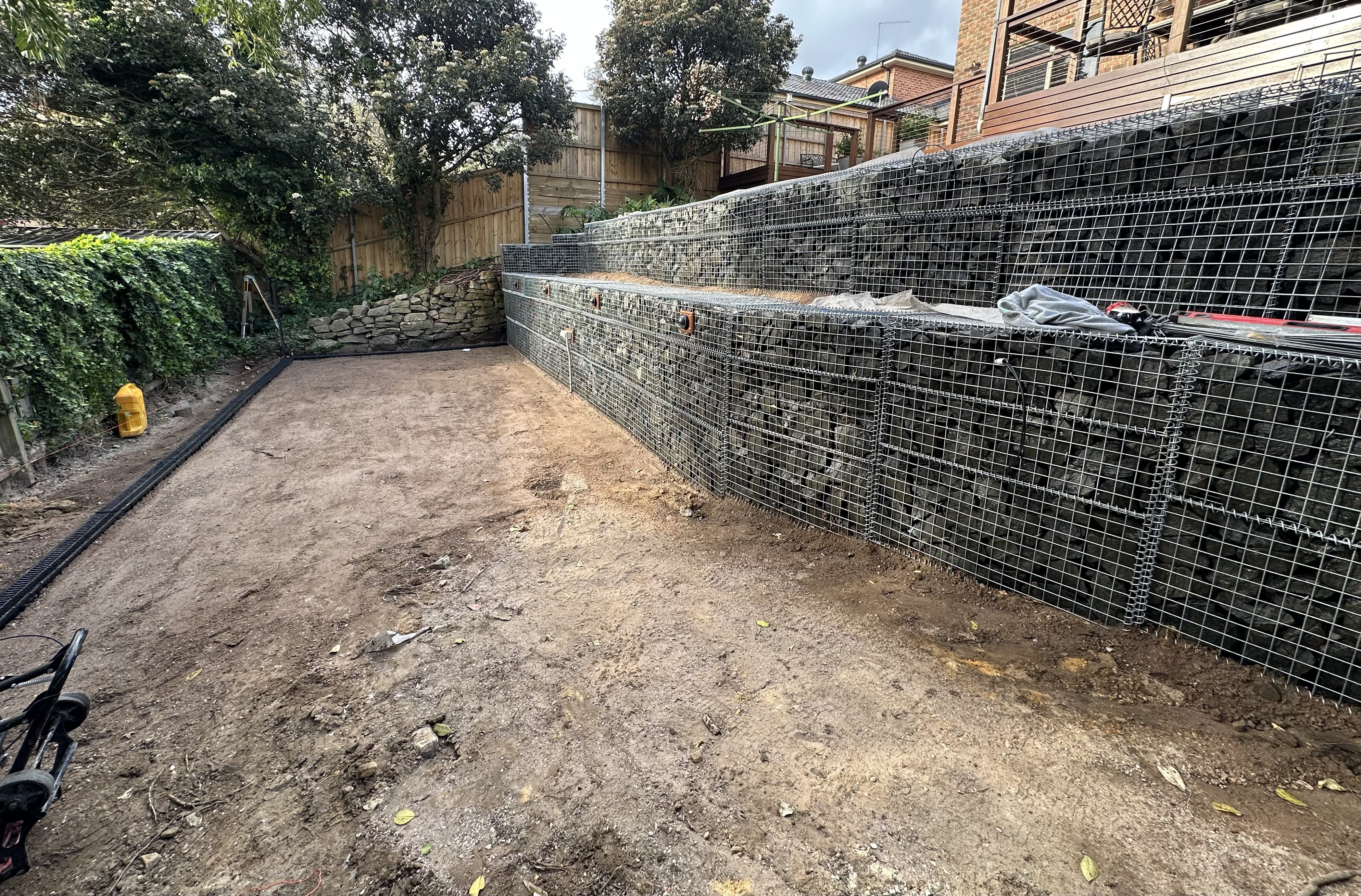 Retaining wall under construction - Elite Landscaping